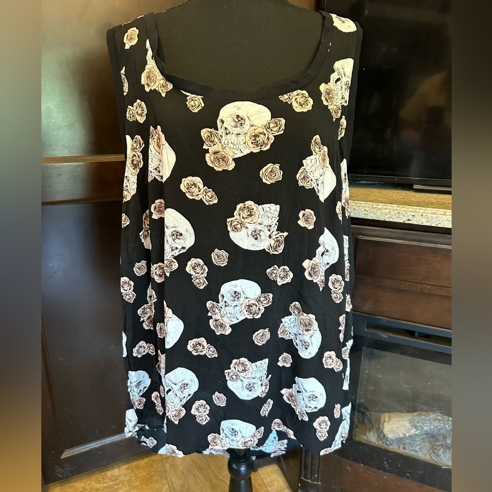 Torrid sleeveless top. Size 4. Skulls and roses. Black.